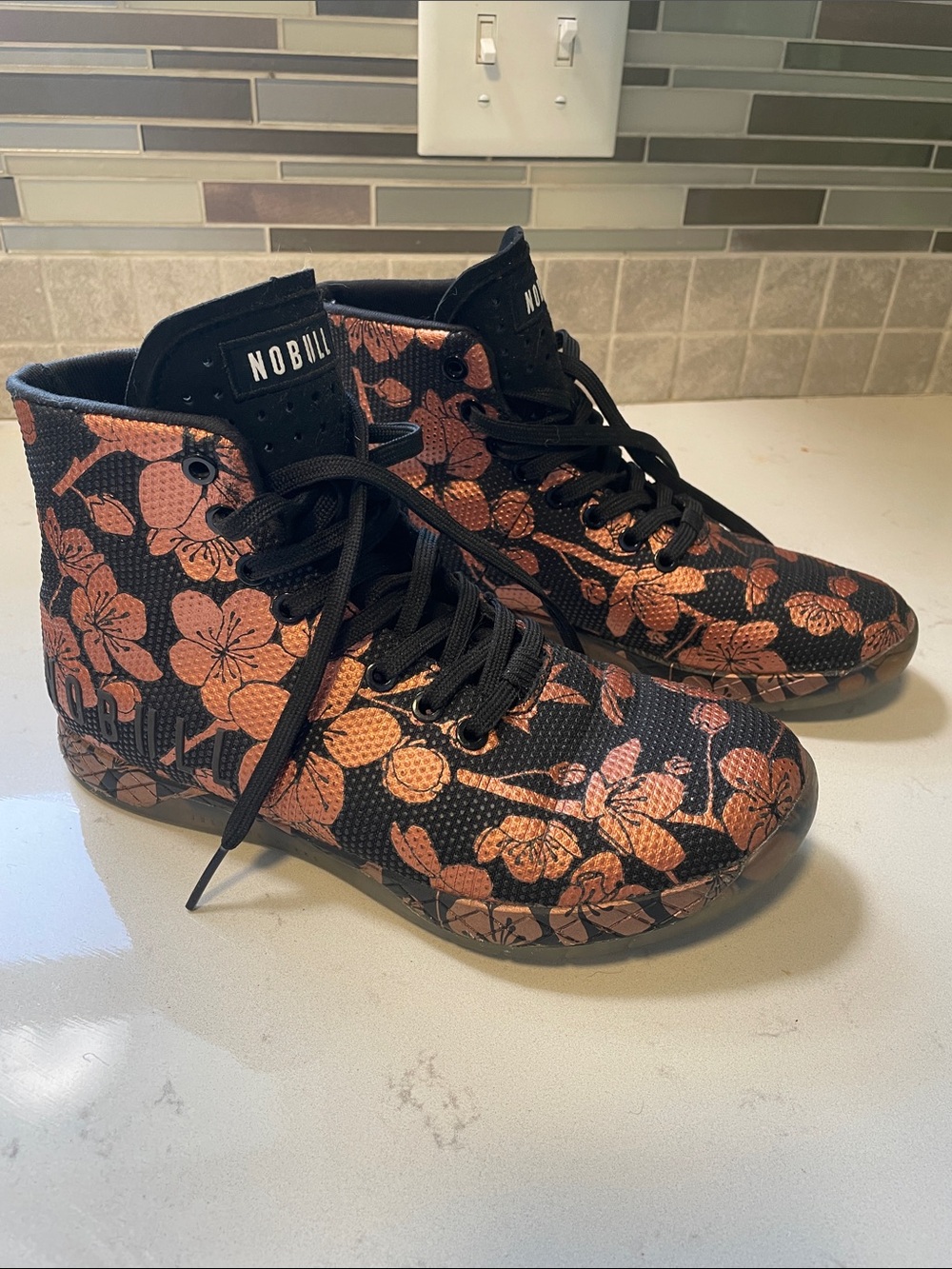 NOBULL Black & Copper Floral High-Top Trainers